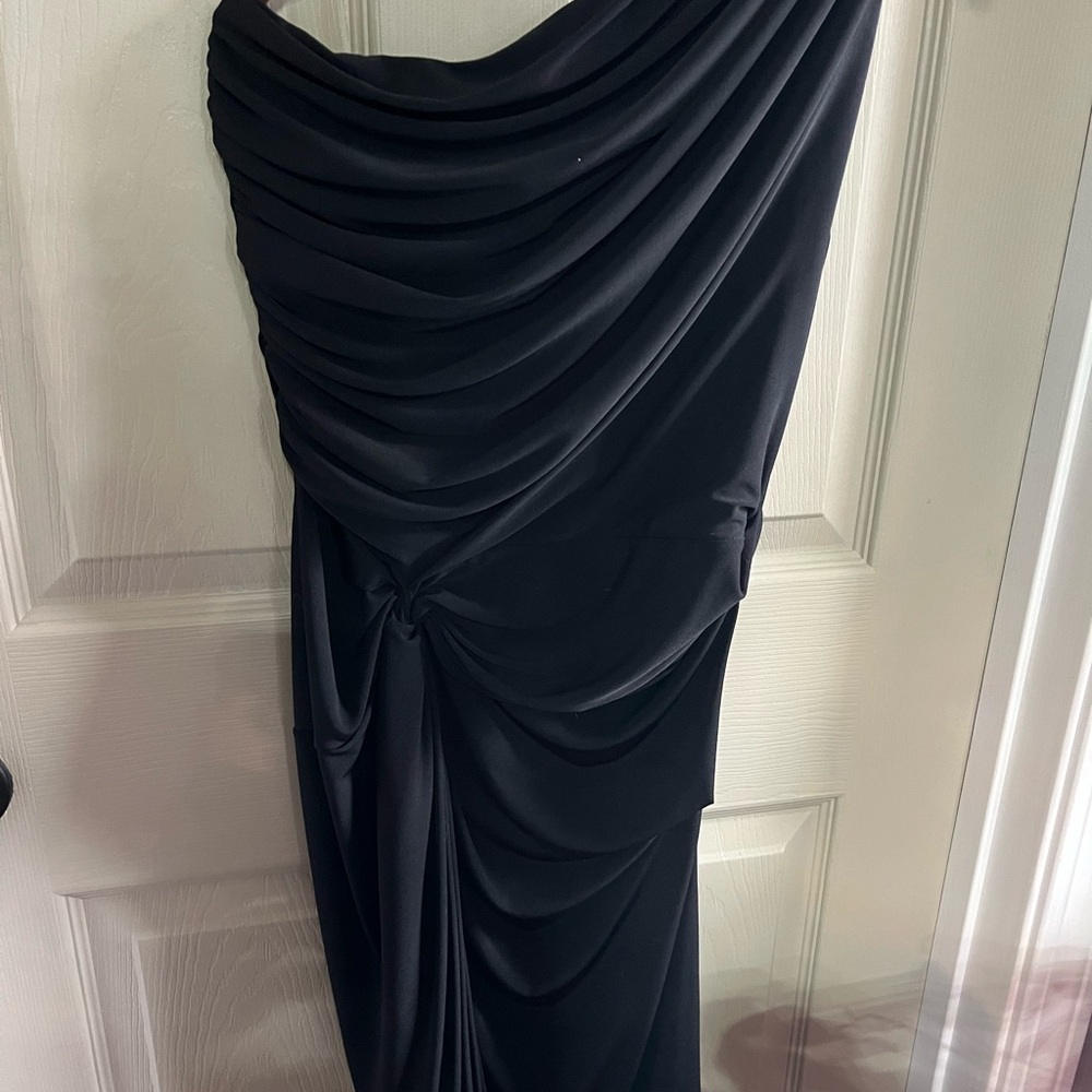 Knee length little black dress; one shoulder with flattering ruched bodice.